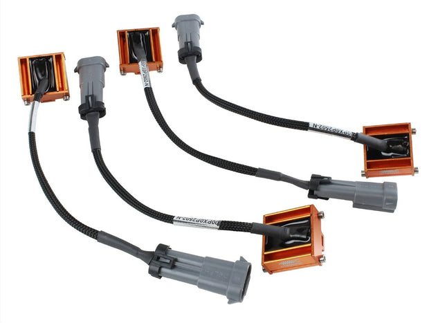 aFe Control Suspension Logic Electronic Shock Delete Modules for 2005-2013 C6 Corvette, anodized aluminum modules installed.